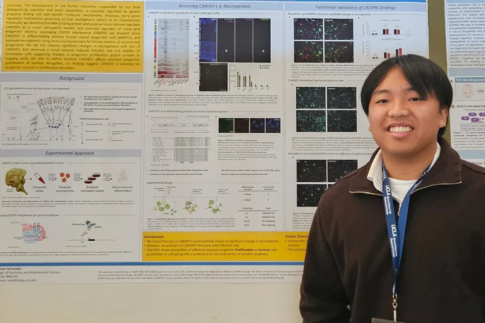 Student presenting a poster