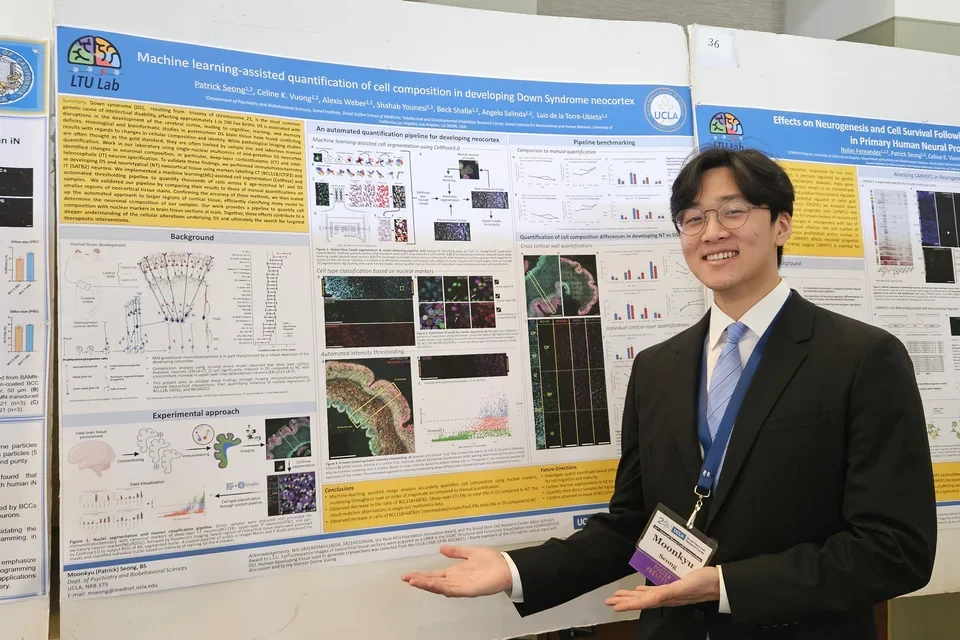 Student presenting a poster