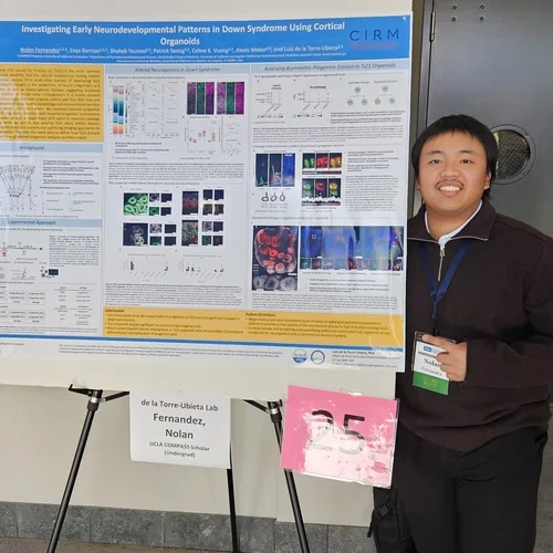 Student presenting a poster