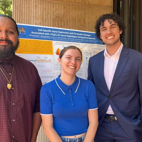 Jesus Mauricio, Emily Friedman and Martin Ibarra at a poster session